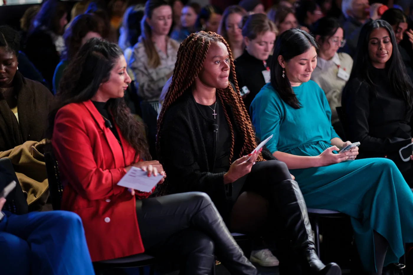 Speaker on stage at a Female Founders Rise event Speaker on stage at a Female Founders Rise event